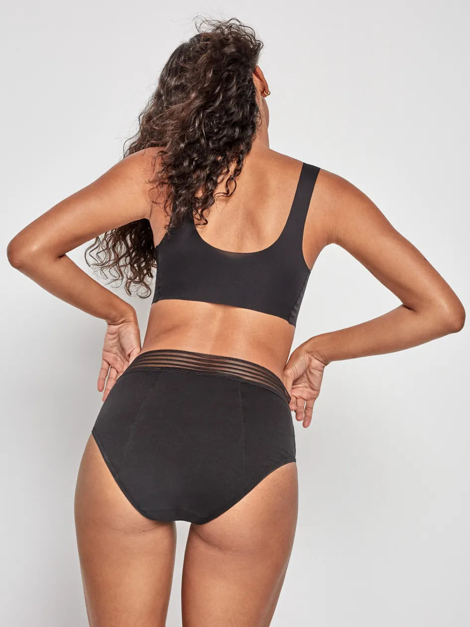 Braguita alta menstrual en tejido  alta absorción