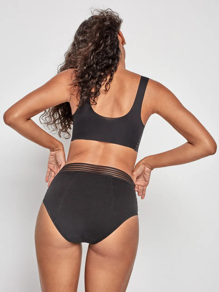 Braguita alta menstrual en tejido  alta absorción